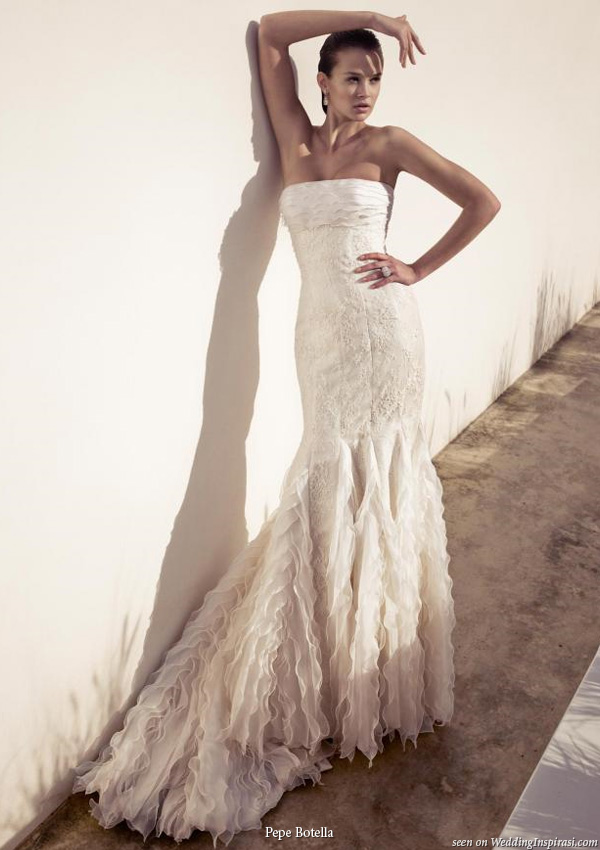 Strapless wedding dress with ruffle skirt by Spanish bridal design house