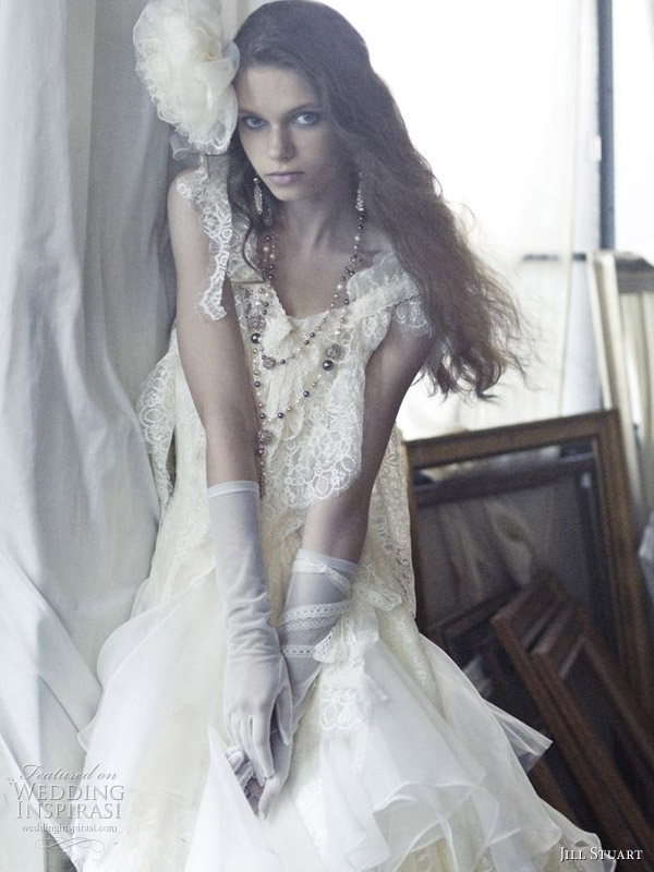 Shabby chic wedding gown worn with pearls and gloves by Jill Stuart