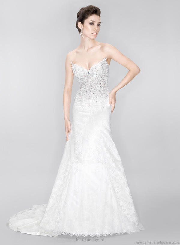 Strapless wedding gown embellished with Swarovski crystals jewels by Julia 