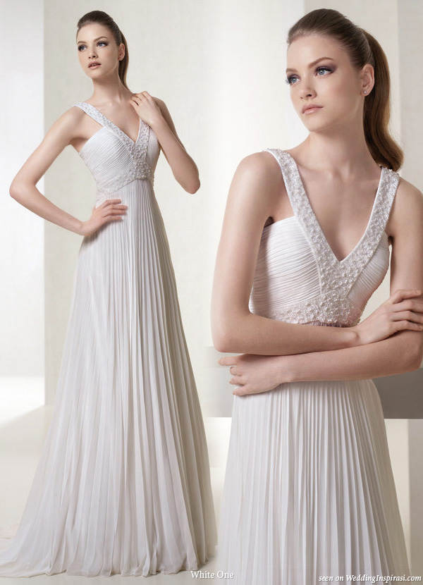 Love the slimming effect of the deep V strap Deep vneck wedding gown from