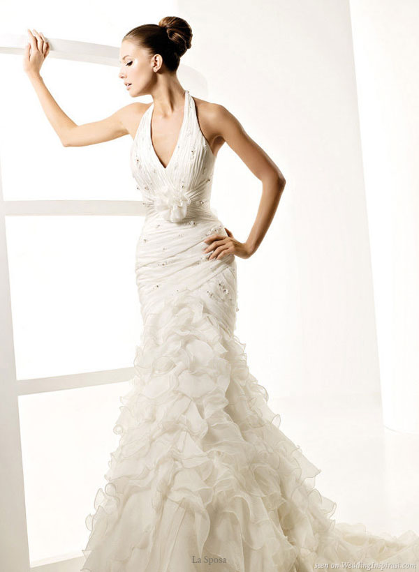 Halter neck mermaid fit and flare Lago wedding dress with ruffle skirt from