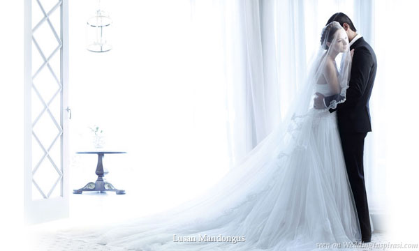 The perfect bridal gown for a romantic white wedding theme by Lusan 
