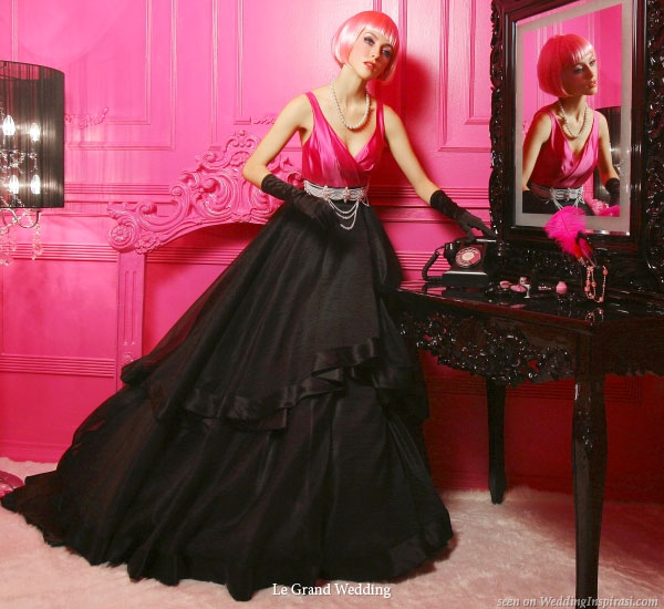 Cotton candy Bride wears a short pink with a hot pink and black wedding 
