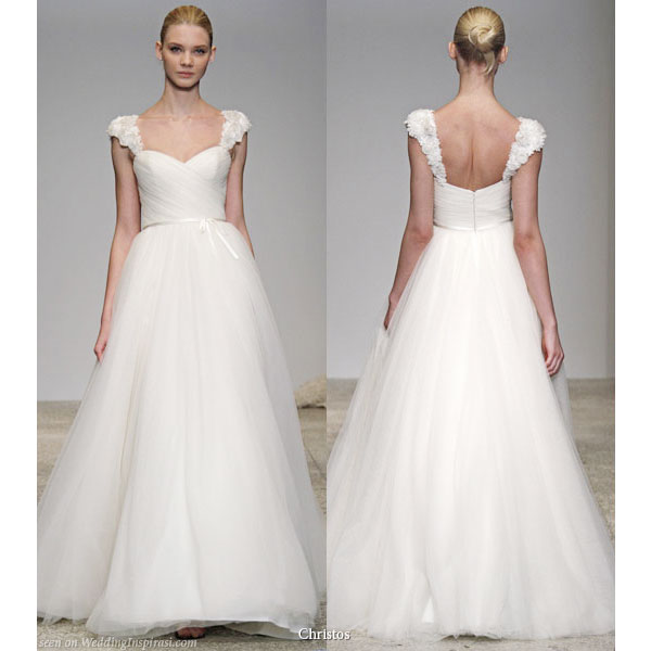 The highlight of this Brisa wedding dress is the lovely cap sleeve straps 