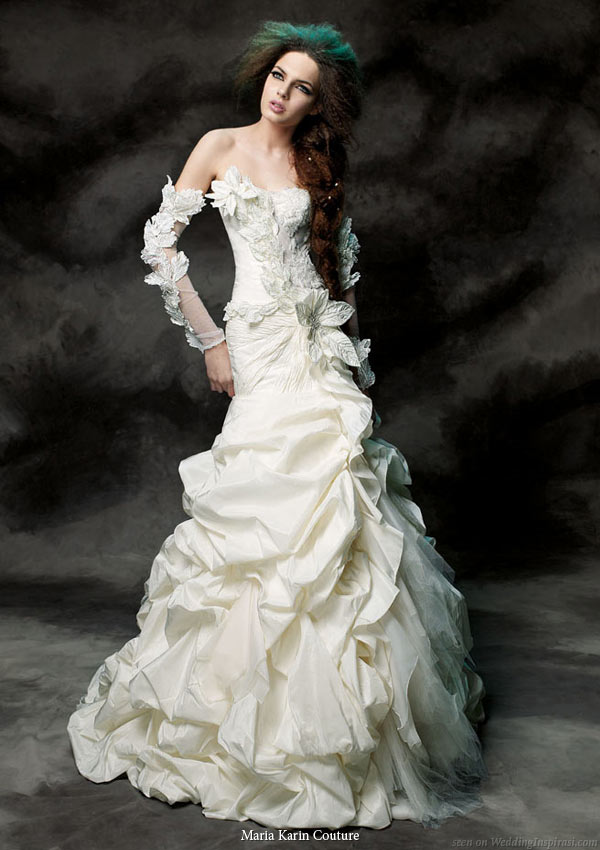 Strapless wedding dress with gathered pickup skirt and detached long sleeves