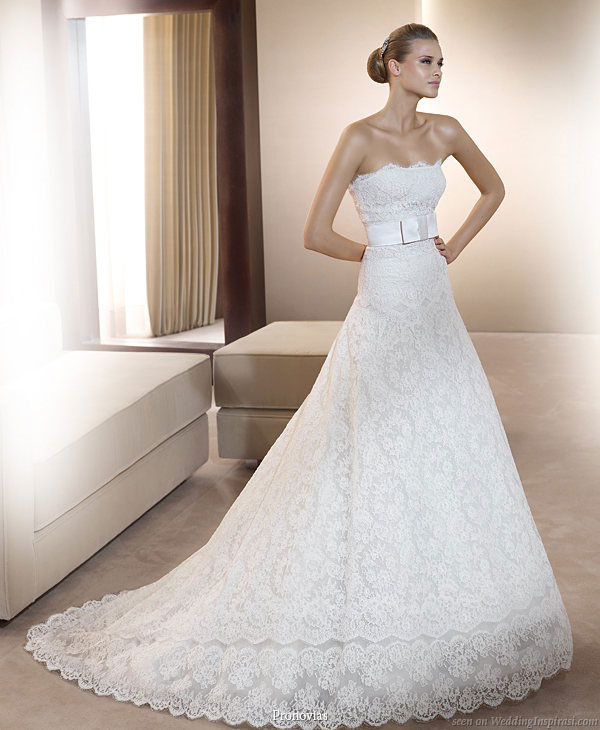 Pronovias 2011 Bridal Gown Collection - Idilio strapless lace wedding dress with matching sash