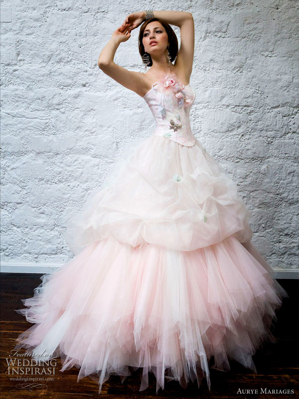 It's not often we start a post with a pink wedding gown but this strapless