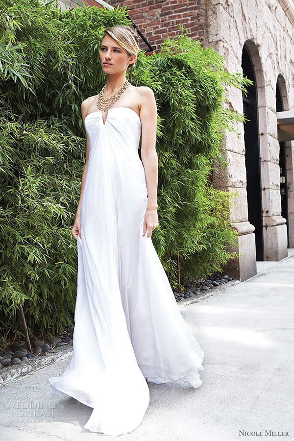 Double layered silk chiffon strapless gown The chunky necklace goes well