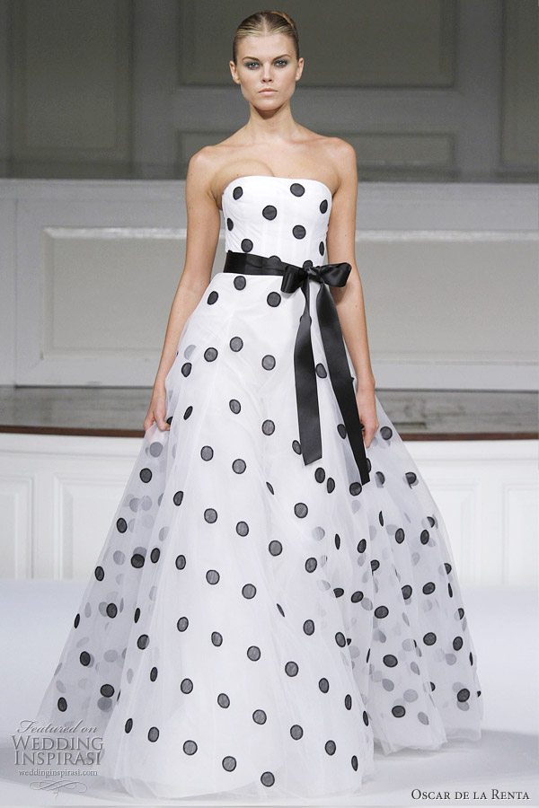 Polka dots Ivory silk tulle and black dot embroidered gown with satin bow 
