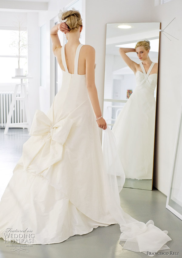 wedding dresses with straps 2011. Wedding gown with bow bustle