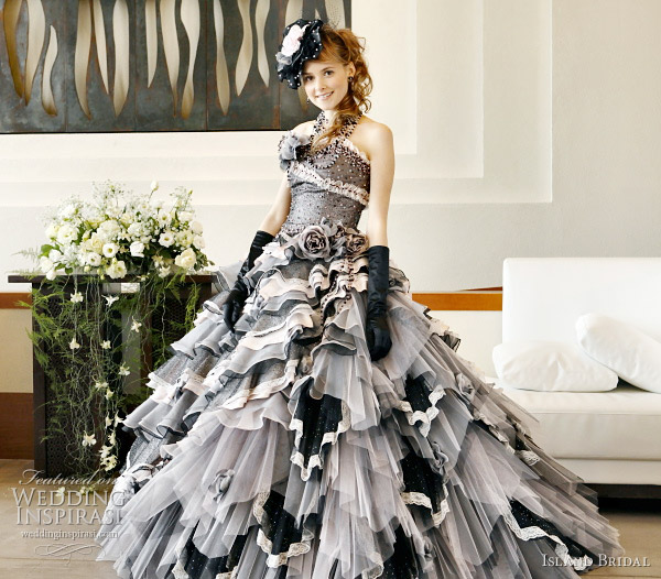 Black color wedding dress with pink accents by Island Bridal