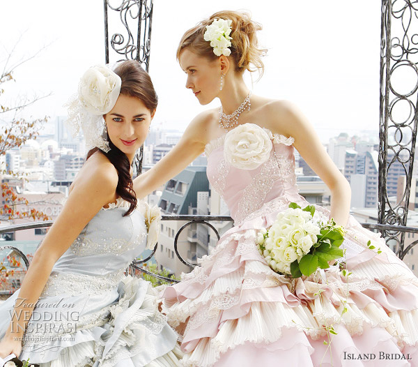 Baby blue and pink wedding dresses from Island Bridal - strapless style with ruffle skirt