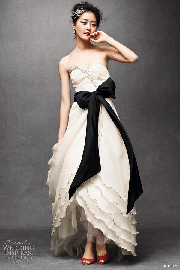 bhldn wedding - tiered tulip bridal gown in buttercream with black sash