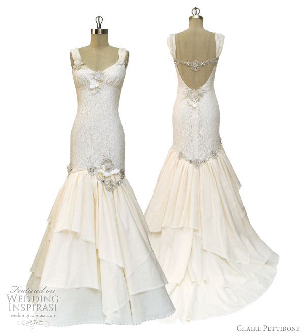 Below Emmeline ivory cotton lace mermaid gown with ruffled skirt and jewels