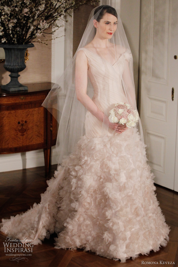 This dress has an elongated bodice romona keveza 2012 wedding dresses