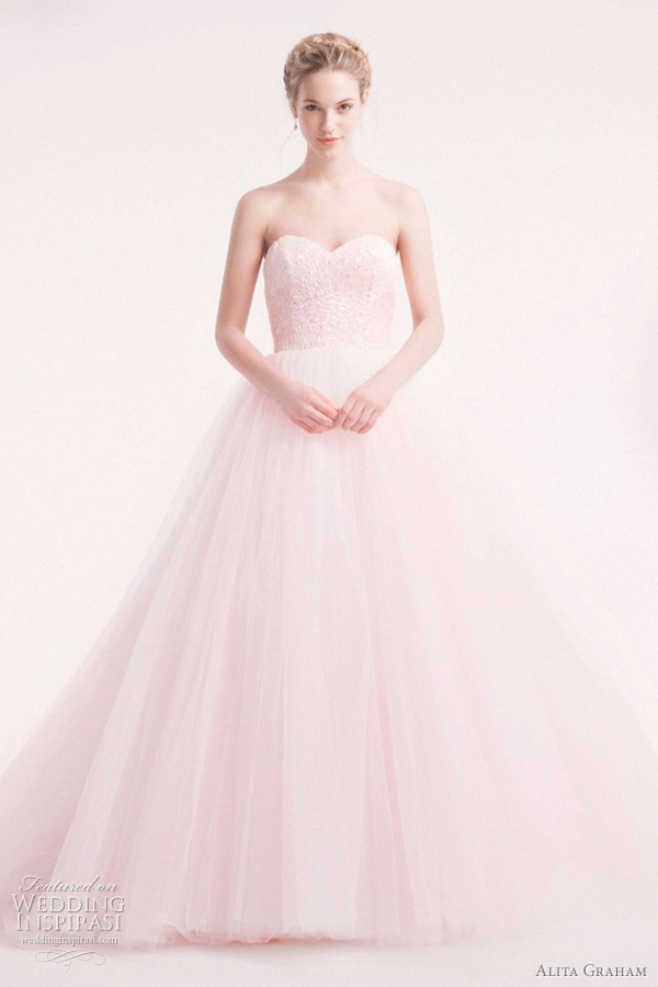 Above a stunning pale pink tulle ball gown with beaded bodice Swoon