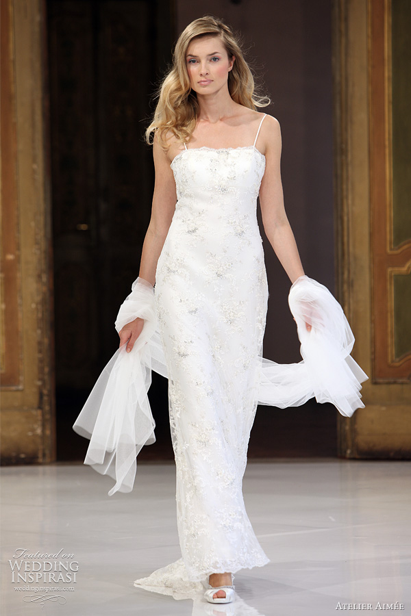 Empire lace accented gowns with three tiered skirt and strapless with a 