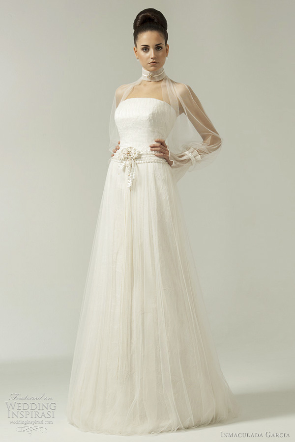 Artemisia gown featuring high collar top with sheer bell sleeves