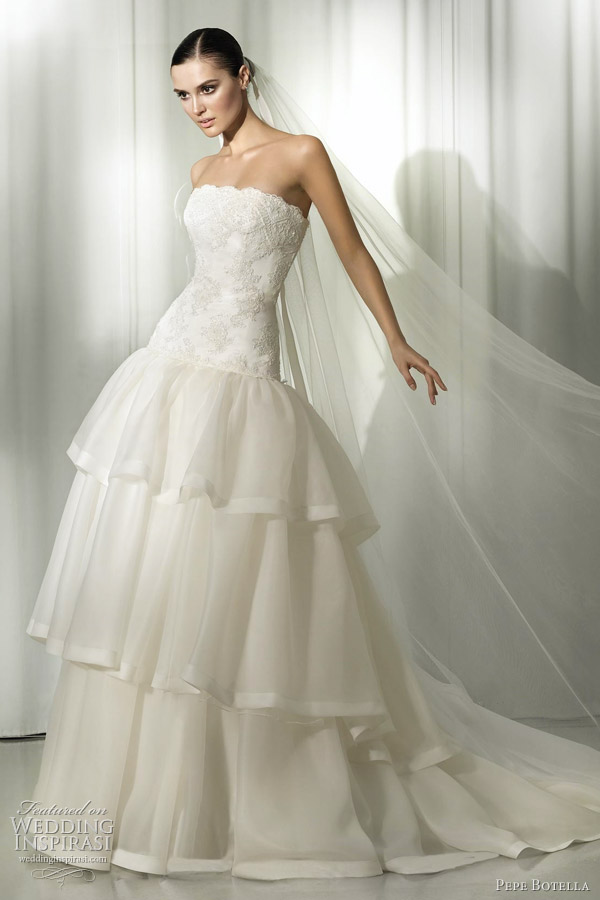 Strapless gown with lace bodice and threetier skirt pepe botella wedding