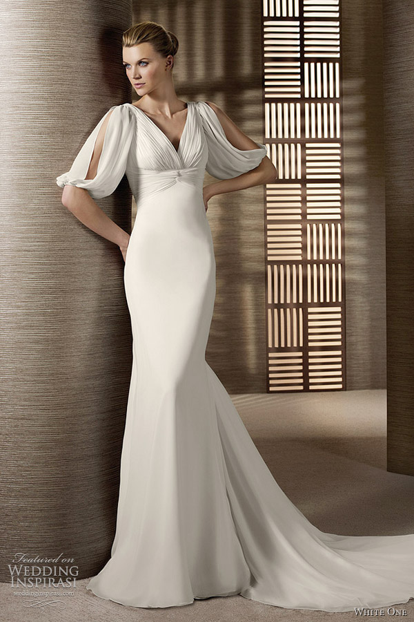 Column gown with elbowlength draped sleeves white one drape sleeve wedding
