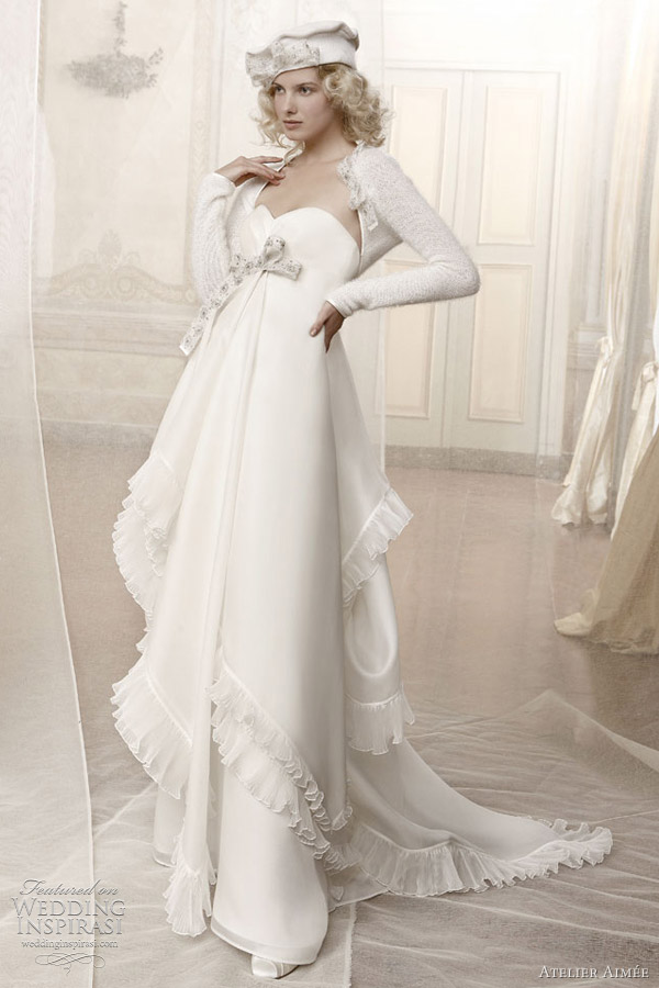 Gown with bow adorning the empire waist winter wedding dresses 2011