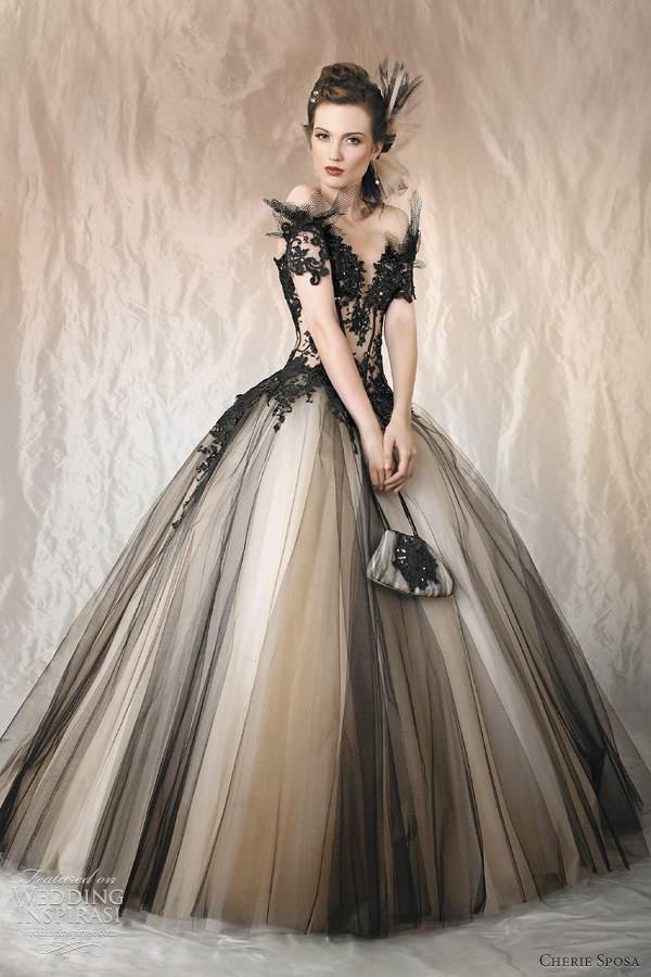 Below Ambre black tulle over amber ball gown wedding dress