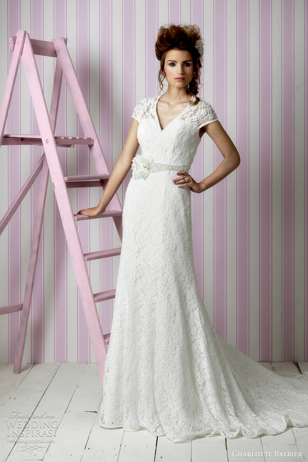 Ava 3 4 sleeve wedding dress featuring French lace bodice with satin sash 
