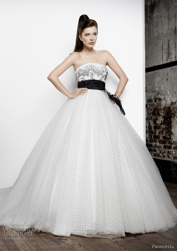 Above Noir et Blanc ivory and black voluminous dress in dotted tulle with