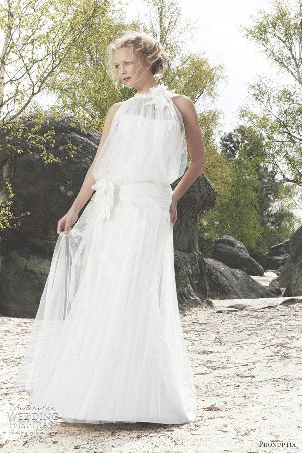 Below Mathilde lace wedding dress featuring closefitting bodice in satin 