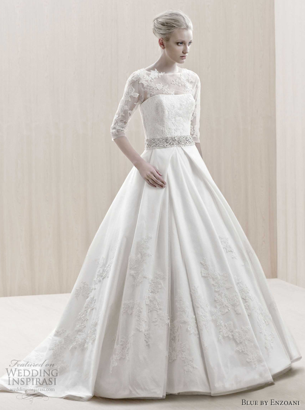 Above England wedding gown with an illusion lace bateau neckline and three