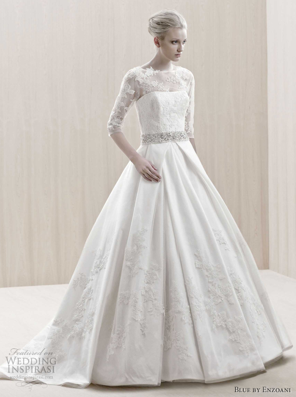 Above England wedding gown with an illusion lace bateau neckline and three Above England wedding gown with an illusion lace bateau neckline and three