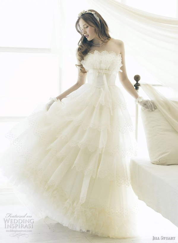 Layer of amazing ruffles and pleats on a gorgeous white wedding gown by American fashion designer Jill Stuart