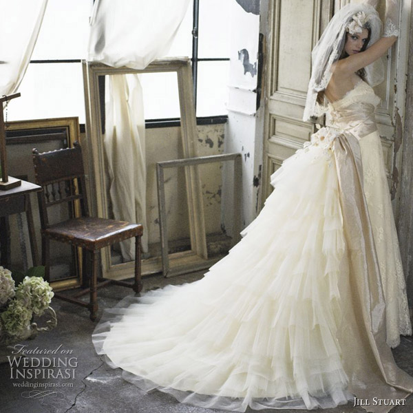 Beautiful wedding gowns with stunning ruffle bustle by Jill Stuart