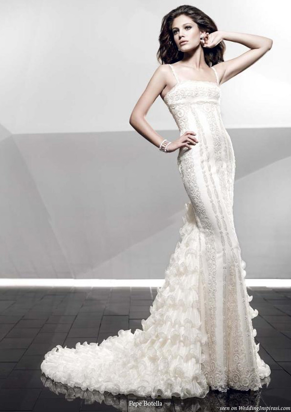 Fitted, slim, slinky and sexy wedding gown with romantic ruffle detail by Pepe Botella Novias