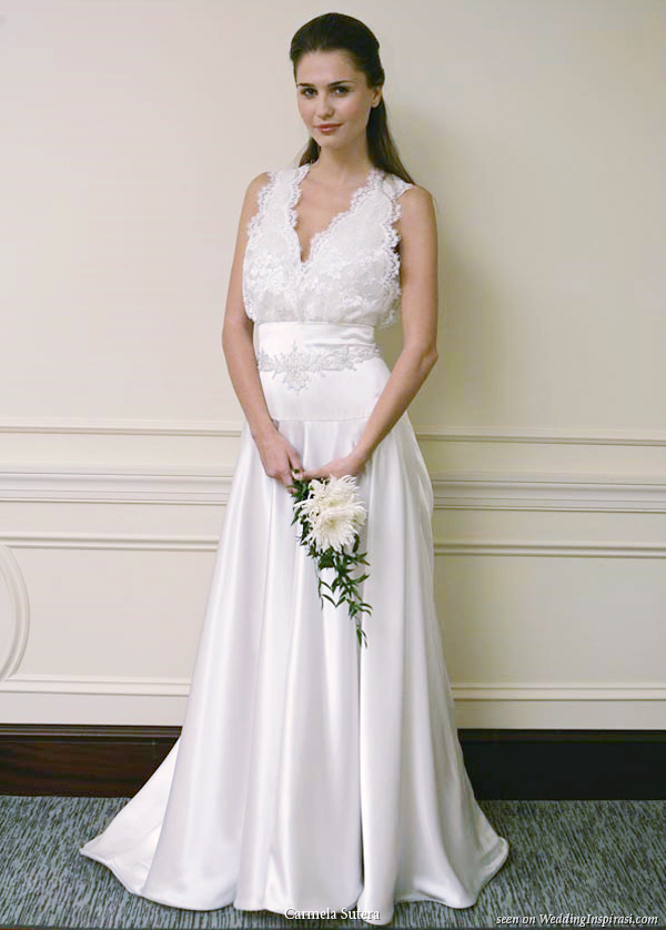 Silk charmeuse bridal gown with circular skirt and Chantilly lace bodice silver threads. Hand beaded and embroidered waistline trim. by Carmela Sutera