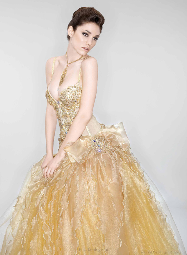 Rich gold wedding dress decorated with Swarovski crystals by Julia Kontogruni