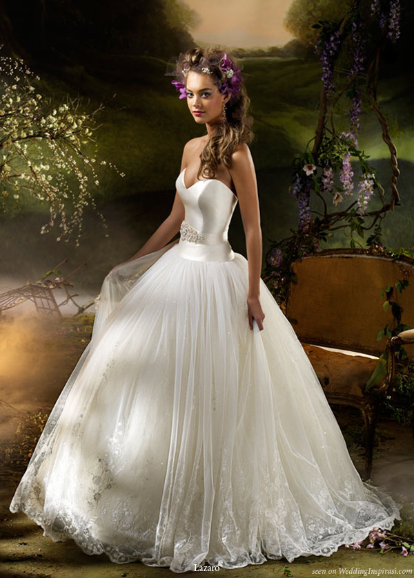 2010 bridal dress collection from Lazaro - Ivory English net formal bridal ball gown, sweetheart neckline, silk Mikado yoke bodice with   vintage fresh water pearl ivory ribbon belt at natural waist, full gathered embroidered English net skirt with sequin tulle underlay, sweep train.