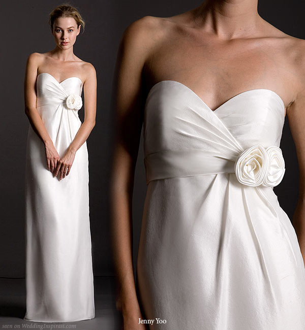 Wedding dress in Shantung silk. Strapless sweetheart dress with attached charmeuse band. Released pleat detail from empire waist. Long column skirt. Designed by Jenny You