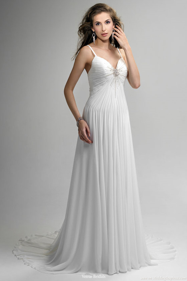 Chiffon rouched bodice gown with spaghetti straps and a gathered skirt and chapel length train. from Venus Bridal's Pallas Athena wedding dress collection