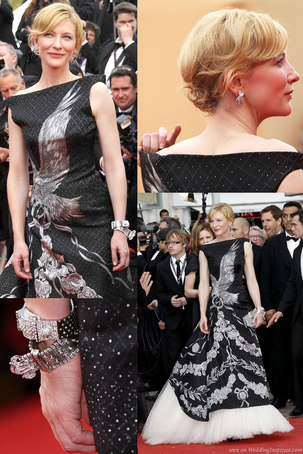 Cate Blanchett in Alexander McQueen pre-Fall 2010 black off-shoulder gown featuring a silver eagle motif and white tulle hem at the Robin Hood premiere during the Cannes Film Festival 2010