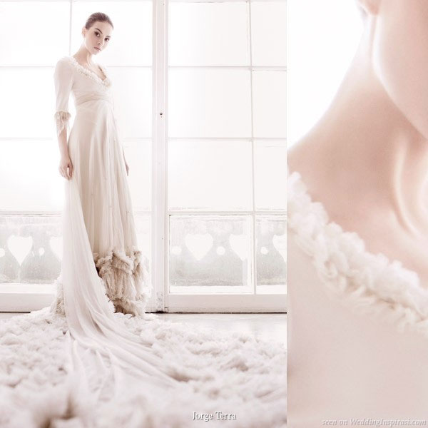 Modest wedding gown with elbow-length sleeves and long train