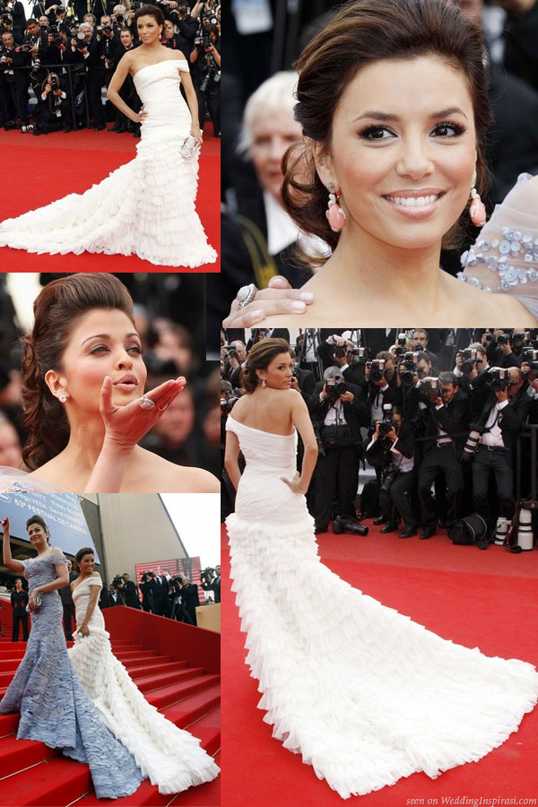 Eva Longoria Parker in Emilio Pucci white silk chiffon ruffle gown featuring a dramatic train, silver Daniel Swarovski clutch, with Aishwarya Rai Bachchan in a powder blue Elie Saab Spring 2010 Couture at the Red Carpet photo call at recent Cannes Film Festival