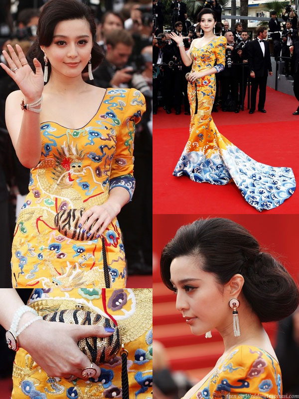 Fan Bing Bing in a yellow embroidered dragon robe (long pao) featuring oriental motifs designed by chinese fashion designer Laurence Hsu