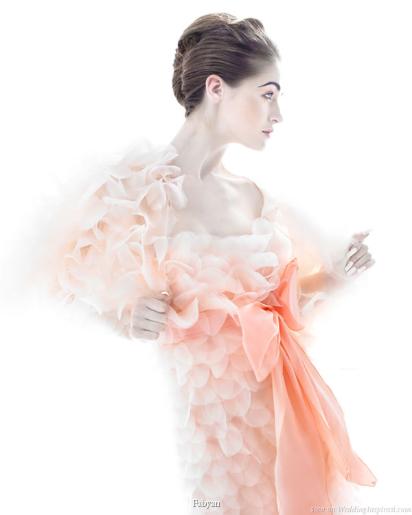 Coral peach - salmon hued petal wedding dress with large orange bow sash by Fabyan 2010 bridal mariage collection