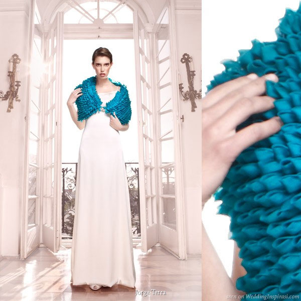 Sheath wedding gown with bright blue shoulder warmer shawl