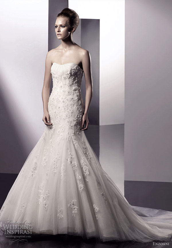 Enzoani 2010 bridal gown collection -  Elle wedding dress strapless scoop mermaid silhouette with gathered tulle bust, empire waist tulle overlay with lace embroidery and beading; semi-cathedral train