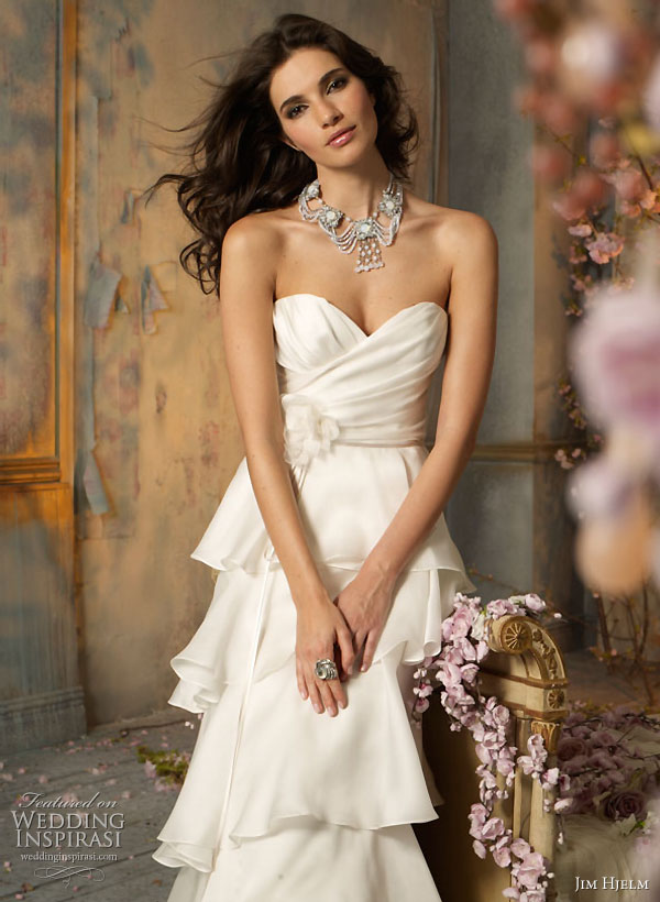 Jim Hjelm 2010 Fall wedding dress collection - Ivory Silk Satin Faced Organza modified A-line tiered bridal gown, strapless draped bodice with floral crystal applique, natural waist, sweep train.