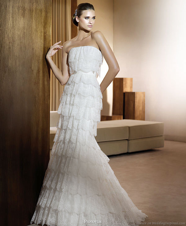 Pronovias 2011 Bridal Gown Collection - Icono wedding dress with  multiple tiers of lace ruffles and volants 