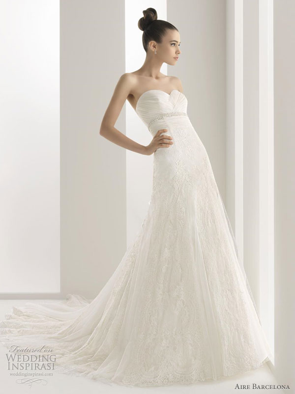 Aire Barcelona Wedding Gown 2011 collection -- Noelia Embroidered lace gown adorned with organza and jeweled stones