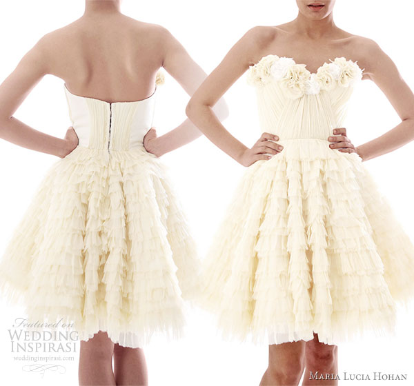 Maria Lucia Hohan Fall/Winter 2010-2011 bridal collection - Flower wedding dress in butter, beautiful draped mousseline bust with silk flowers. multi layered ruffled skirt, can be worn with an extra rigid tulle skirt for more volume shown with jupe tulle underneath the skirt Maria Lucia Hohan Fall/Winter 2010-2011 bridal collection - Flower wedding dress in butter, beautiful draped mousseline bust with silk flowers. multi layered ruffled skirt, can be worn with an extra rigid tulle skirt for more volume shown with jupe tulle underneath the skirt